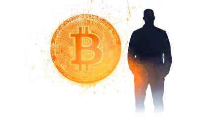 Businessman looking at glowing bitcoin symbol and binary codeの素材