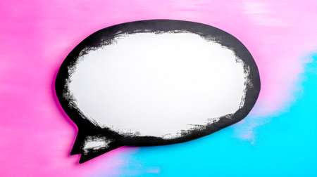 Blank speech bubble over pink and turquoise background with copy spaceの素材
