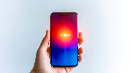 Hand holding smartphone with no data message on screenの素材