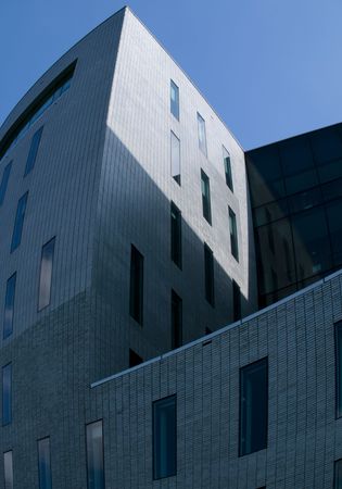 Modern building against blue skyの写真素材