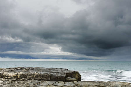 overcast sky before rain near the sea