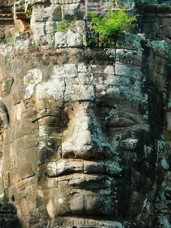 head of king jayavarman vii at south gate of angkor thom, cambodiaの写真素材
