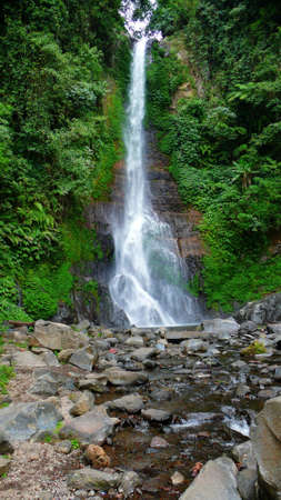 the gitgit waterfall on singaraja, bali, indonesiaの写真素材
