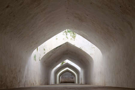 sumur gumantung, the underground walkway tunnel, taman sari water castle - the royal garden of sultanate of jogjakartaの写真素材