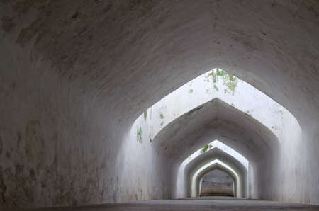 sumur gumantung, the underground walkway tunnel, taman sari water castle - the royal garden of sultanate of jogjakartaの写真素材