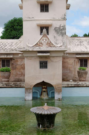 fountain on the ancient pool at taman sari water castle - the royal garden of sultanate of jogjakartaの写真素材
