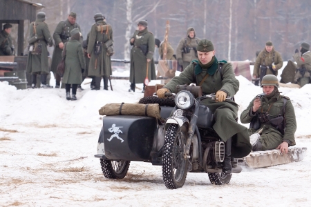 KIROVSK, RUSSIA - FEB 23: Participants of historical reenactment of breaking the siege of Leningrad (18.01.1943) on February 23, 2013 on Nevsky Pyatachok Memorial (national Russian landmark of the World War II), Kirovsk, Russia.のeditorial素材