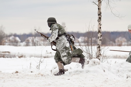 KIROVSK, RUSSIA - FEB 23: Historical reenactment of breaking the siege of Leningrad (18.01.1943) on February 23, 2013 on Nevsky Pyatachok Memorial (national Russian landmark of the World War II), Kirovsk, Russia.のeditorial素材