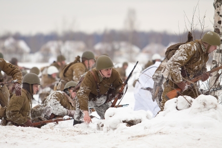KIROVSK, RUSSIA - FEB 23: Historical reenactment of breaking the siege of Leningrad (18.01.1943) on February 23, 2013 on Nevsky Pyatachok Memorial (national Russian landmark of the World War II), Kirovsk, Russia.のeditorial素材