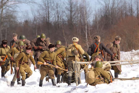 TESSOVO-NETYLSKI, RUSSIA - APR 07: Historical reenactment of the battles for the corridor supply the 2nd Shock Army (april-may 1942) on april 07, 2013 in Tessovo-Netylski, Novgorod region, Russiaのeditorial素材