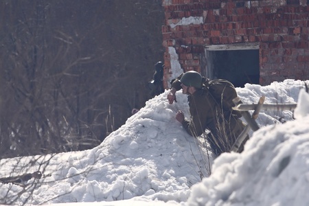 TESSOVO-NETYLSKI, RUSSIA - APR 07: Historical reenactment of the battles for the corridor supply the 2nd Shock Army (april-may 1942) on april 07, 2013 in Tessovo-Netylski, Novgorod region, Russiaのeditorial素材