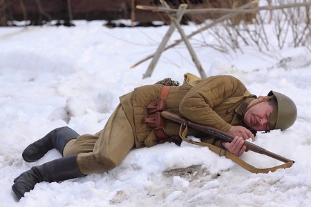 TESSOVO-NETYLSKI, RUSSIA - APR 07: Historical reenactment of the battles for the corridor supply the 2nd Shock Army (april-may 1942) on april 07, 2013 in Tessovo-Netylski, Novgorod region, Russiaのeditorial素材