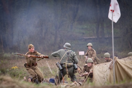 ST. PETERSBURG, RUSSIA - MAY 12: Historical reenactment of the combats in may 1945 in Czechoslovakia on May 12, 2013 in St. Petersburg, Russia.のeditorial素材