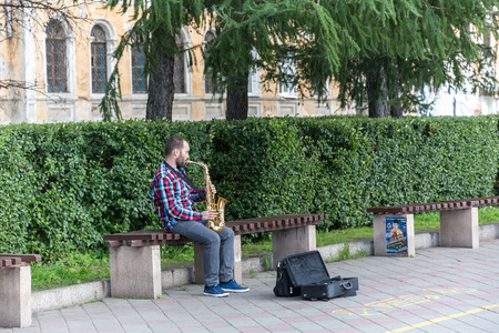 YEKATERINBURG, RUSSIA - AUG 07: Unidentified saxophone player on August 07, 2015 in Yekaterinburg, Russia.のeditorial素材