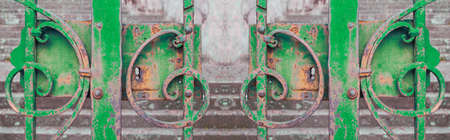 Green iron gate closedの写真素材