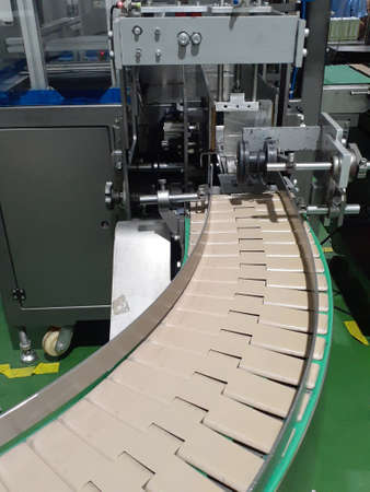 Bottle conveyor belt for wrapping machine.の写真素材