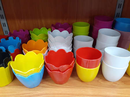 Small plastic pots for plant care.の写真素材