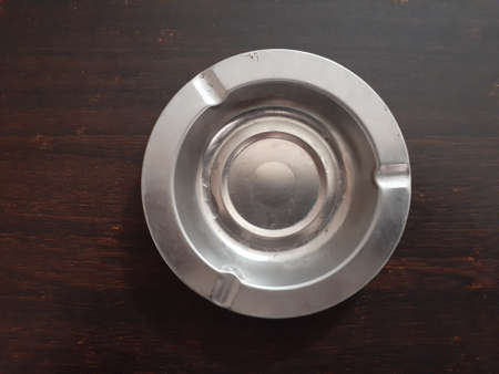 Empty ashtray on restaurant table.の写真素材