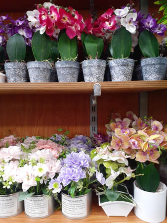 Artificial flowers vase in shopping center.の写真素材