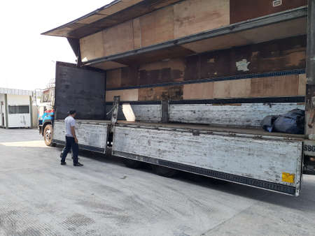 An empty cargo truck. Preparation for loading goods into truck.のeditorial素材