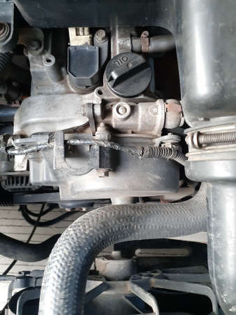 Under the hood of the car. Car engine under the hoodの写真素材