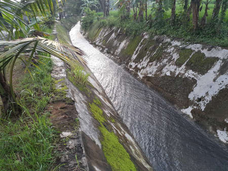 Small canal or ditch in a rural field.の写真素材
