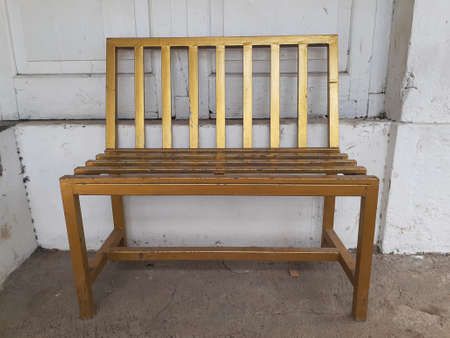 Old bench on the terrace of the house.の写真素材