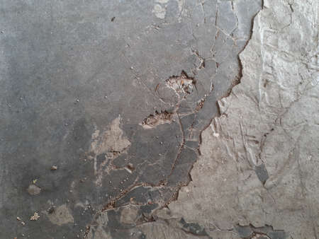 Fractured and cracked concrete floor surface.の写真素材