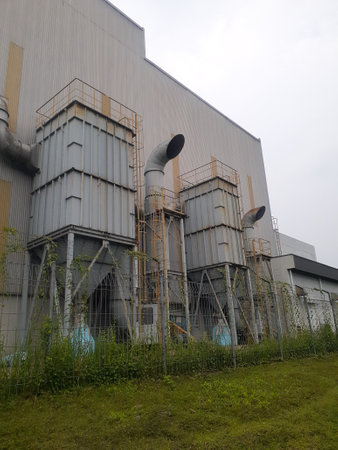 The dust collector system, also known as the baghouse or bag filter used in a factory.の写真素材