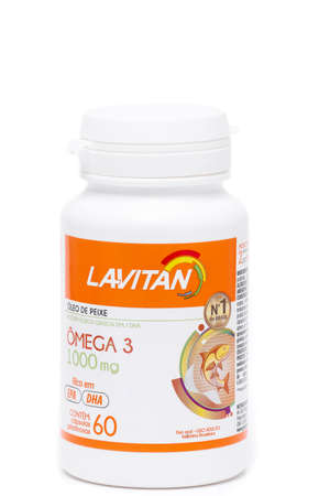 SÃO PAULO, BRAZIL- OCTOBER, 03, 2020 pack of lavitan omega 3 with 60 isolated capsules in white backgroundのeditorial素材
