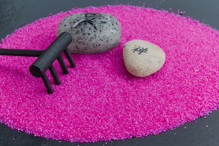 Rake garden relaxing with sand and stonesの写真素材