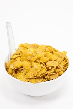 Cup corn grain and white backgroundの写真素材