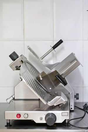 Industrial machine for cutting meats or sausagesの写真素材