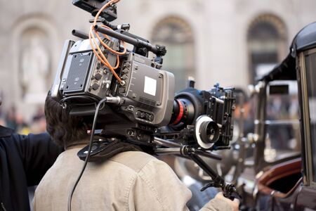 Television camera recording a scene from a movie