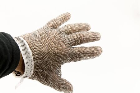 Hand of a worker with a mesh glove anticutの写真素材