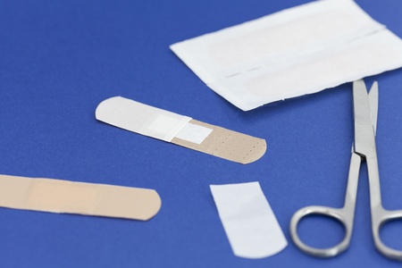 Close up of a few strips with scissorsの写真素材