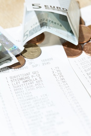 Ticket market with few euro coinsの写真素材