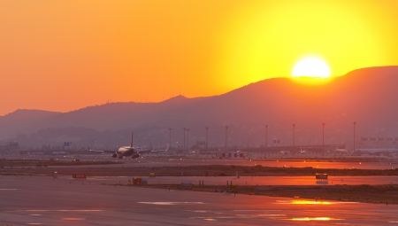 The first plane of a plane that is going to landの写真素材