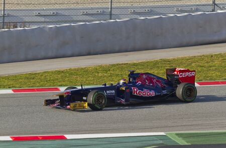 BARCELONA - MARCH 02: Jean Eric Vergne racing with his new Scuderia Toro Rosso at Formula One Teams Test Days at Catalunya circuit on March 02, 2013 in Montmelo, Barcelona, Spain.のeditorial素材