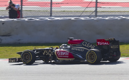 BARCELONA - MARCH 02: Romain Grosjean  racing with his new Lotus F1 Team at Formula One Teams Test Days at Catalunya circuit on March 02, 2013 in Montmelo, Barcelona, Spain.のeditorial素材