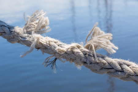 Boat mooring rope about to break