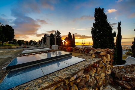 Figures and crosses of an old cemetery in Barcelonaの写真素材