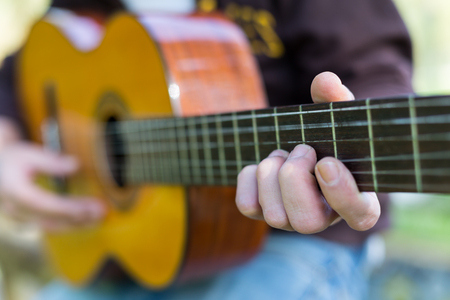 Guitarist playing his guitar on the street