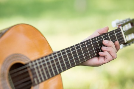 Guitarist playing his guitar on the streetの写真素材