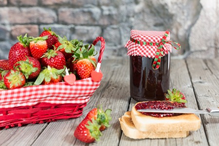 Fresh strawberry jam with toast for breakfastの写真素材