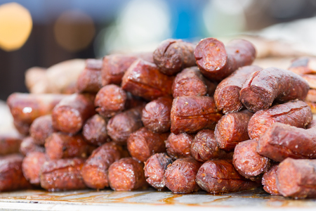 Grilled meat and sausages on a gridironの写真素材
