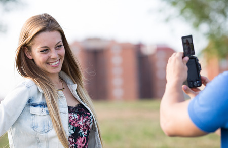 Lovers in the park performing photosの写真素材