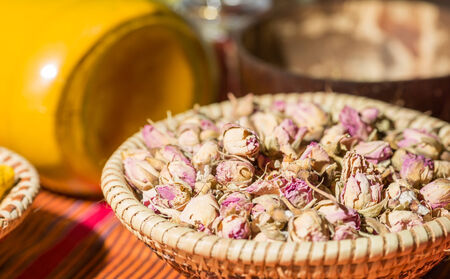 Bowl full of dried rose flavoredの写真素材