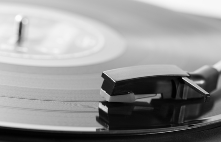 Old turntable with a record playingの写真素材