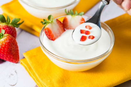Plain yogurt with delicious fresh strawberriesの写真素材